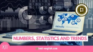 Laptop surrounded by charts and graphs for a C1 advanced vocabulary lesson on numbers, statistics and trends.
